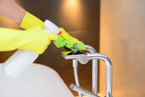 Cleaning team maintaining a Kennington office kitchen and shared area