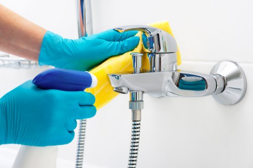 Protective gloves and overshoes used during carpet cleaning